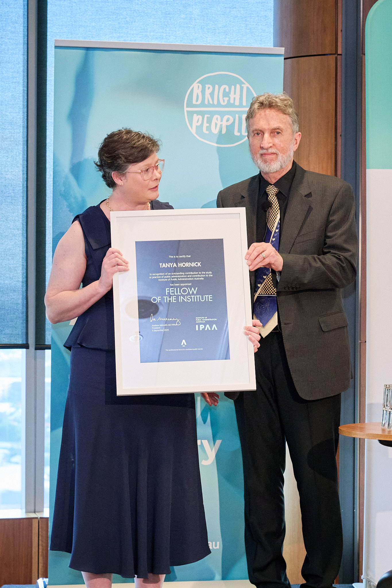 Irene Longman Oration 2025 Prof Brian Head presenting award to Tanya Hornick